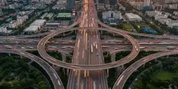 Modern highway interchange illustrating robust infrastructure development and economic activity.